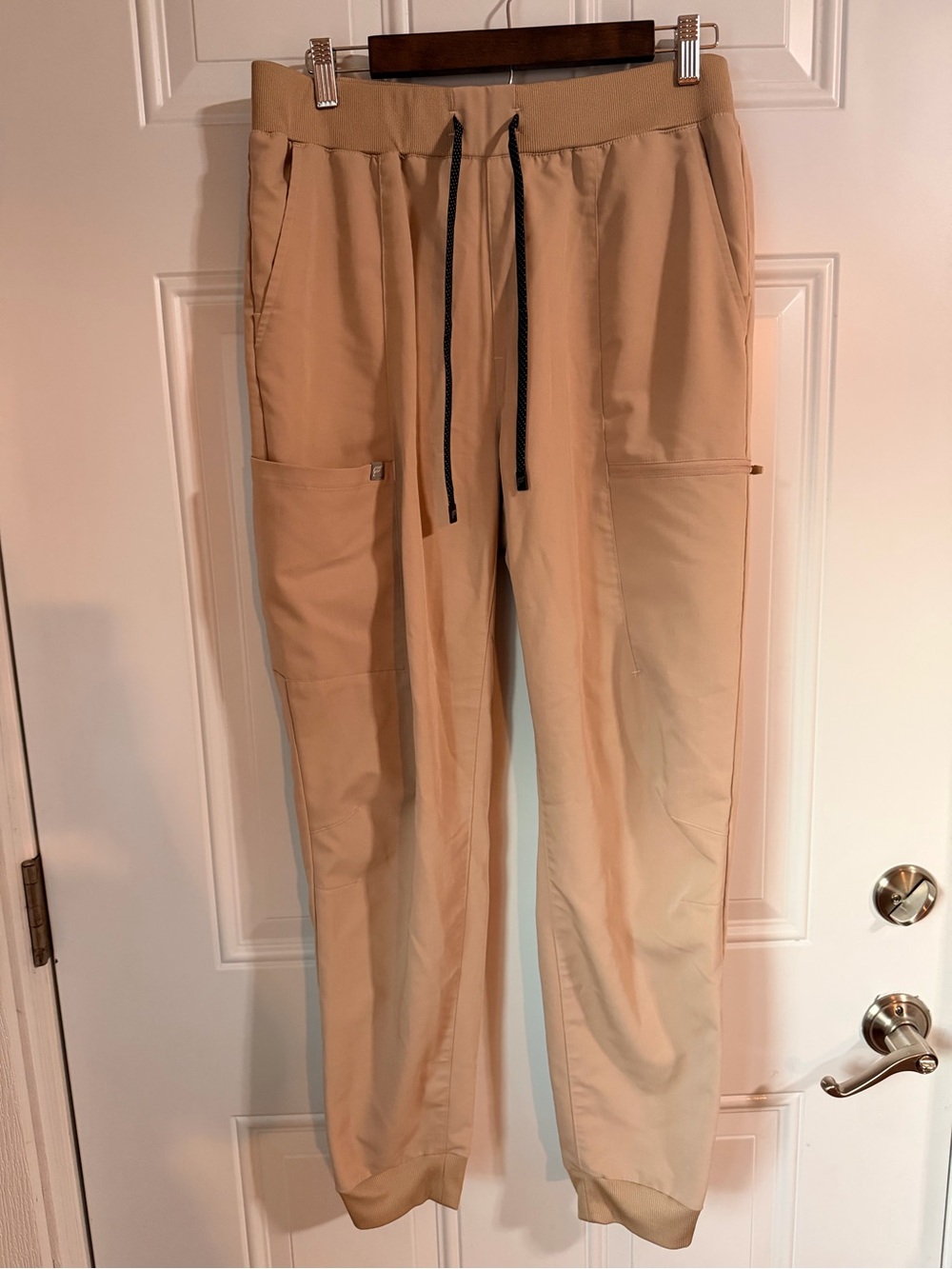 Fabletics Woman’s Beige Drawstring Cargo Scrub Joggers with Black Drawstrings
